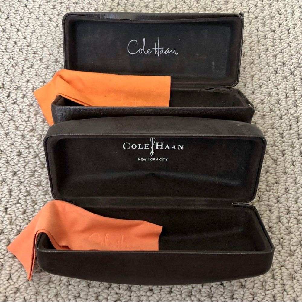 Two Cole Haan sunglasses cases